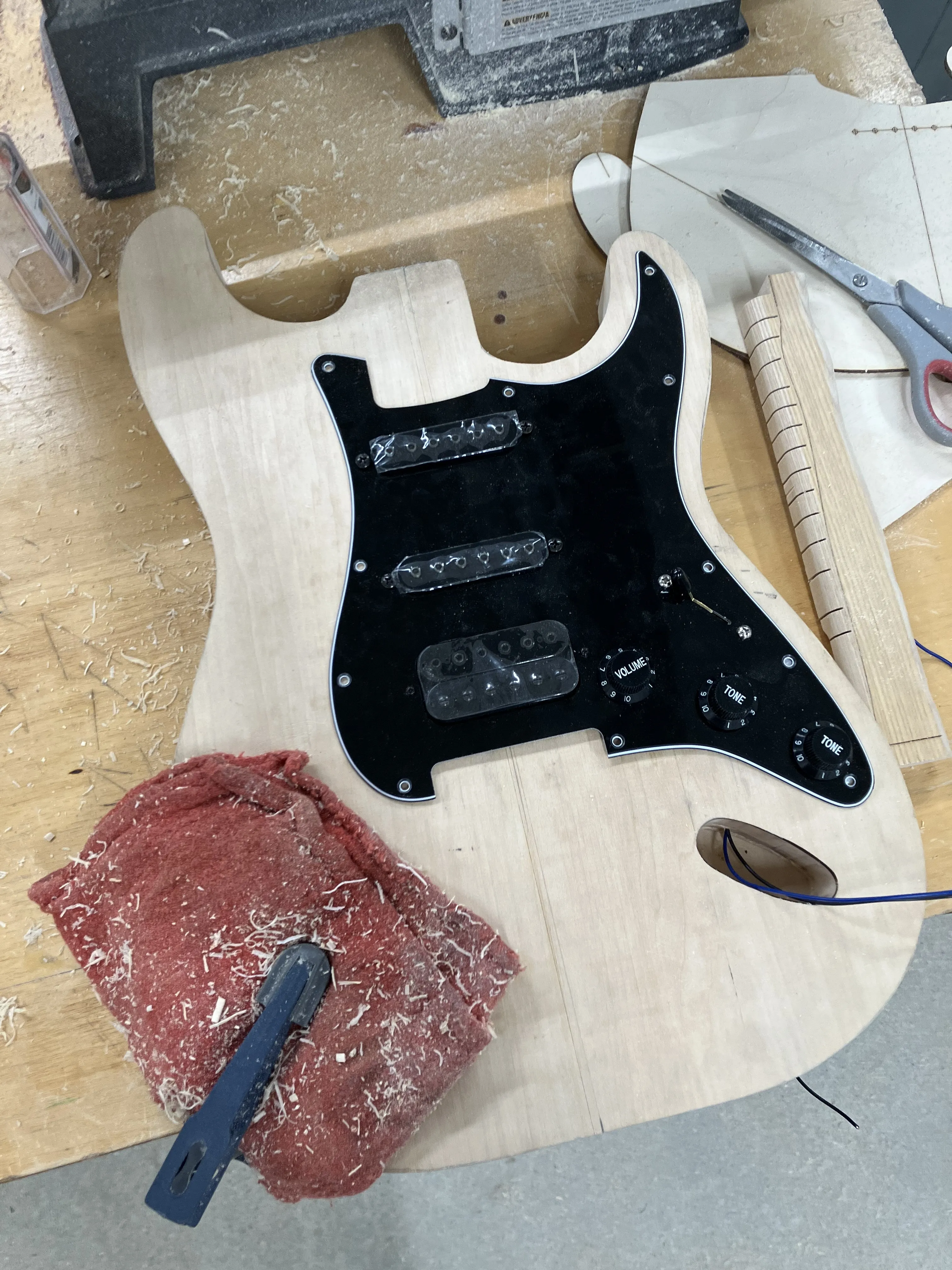 An unfinished electric guitar body